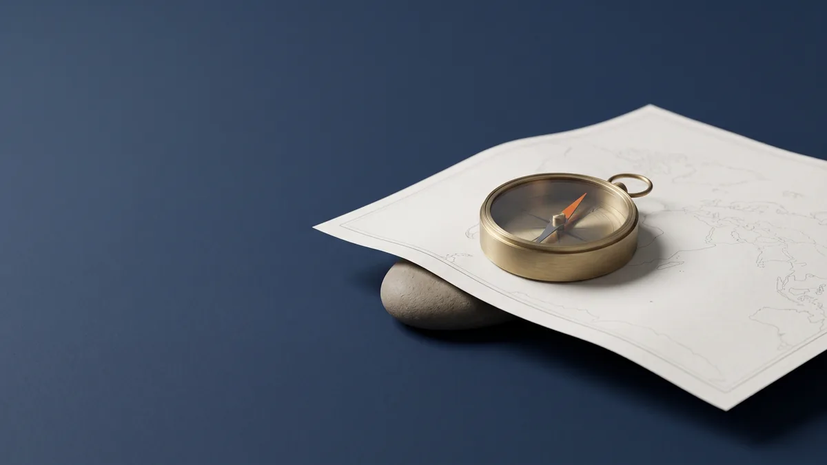 Brass compass with an orange needle on a paper map, the cover image for 2024 SEO Best Practices: How AI Will Change SEO