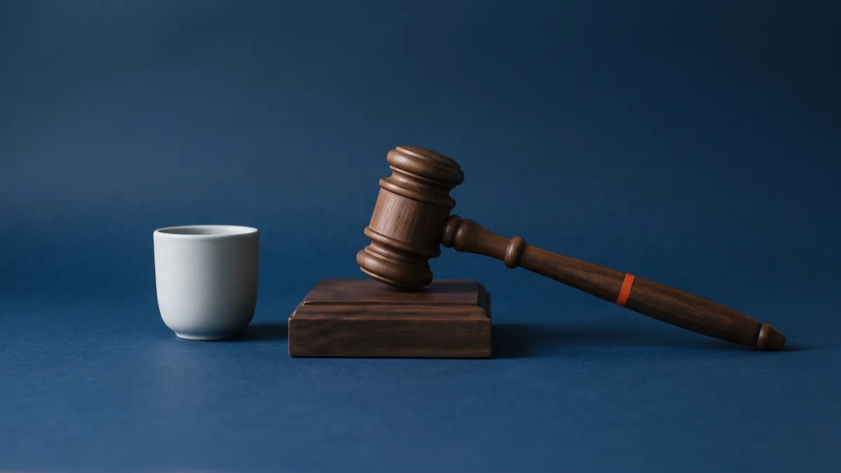Judge's gavel on its sound block, the cover image for Lawsuit Seeks to Shut Down Facebook