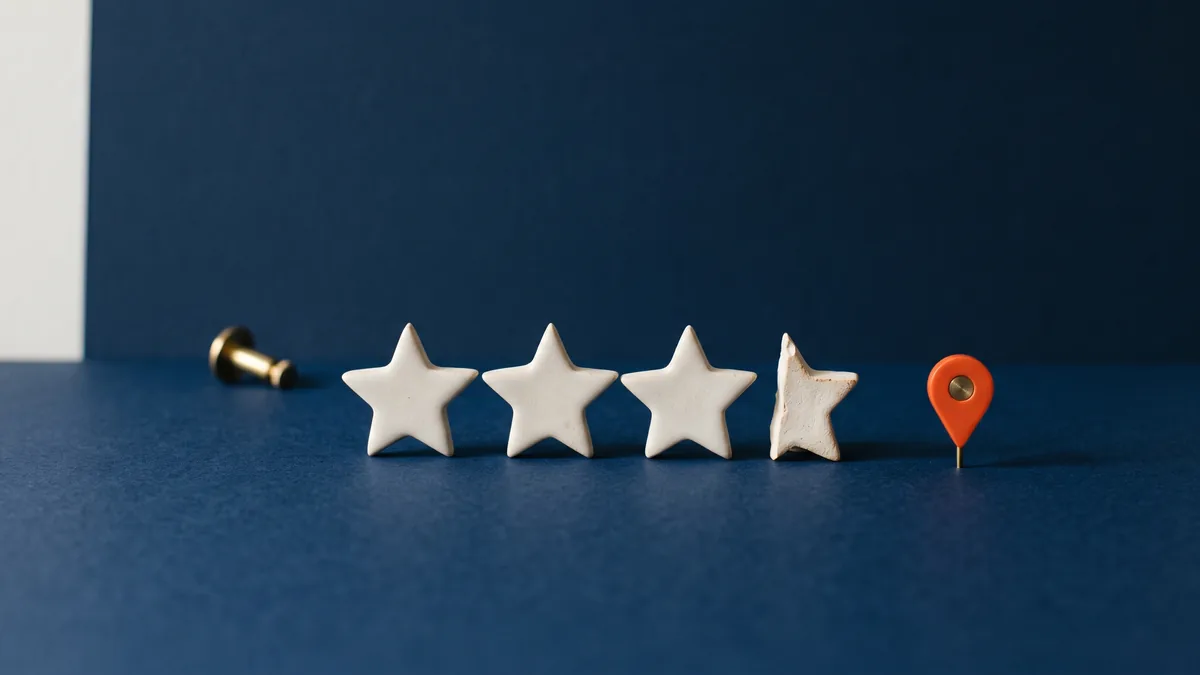 Four and a half ceramic stars beside an orange map pin, the cover image for Local searches with “best” show results with 4.0+ review rating